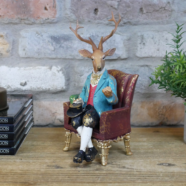 Deer In A Chair