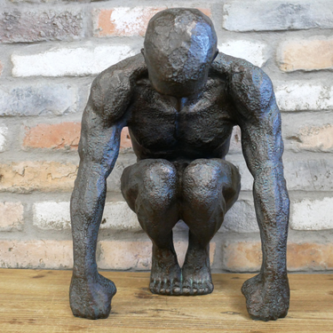 Large Kneeling Man