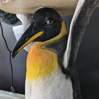 Penguin Holding Trunk Slice Side Table